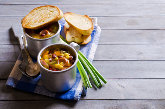 Soup with vegetables and sausages