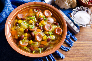Soup with vegetables and sausages