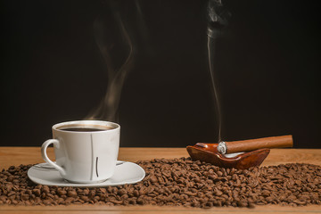 Hot coffee and lit a cigar