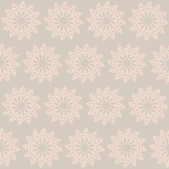vector pattern of pink leafs arranged in circles, on gray backgr