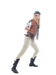 young blonde woman in a steampunk outfit, action hero pose. isolated on white background.
