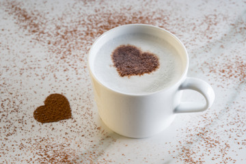 hot drink with heart shape cocoa