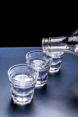 Vodka glasses on the table
