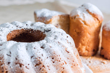 Easter cake with icing sugar and raisins