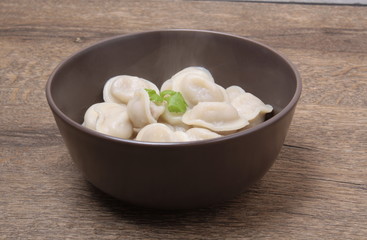 traditional Russian dumplings with sour cream