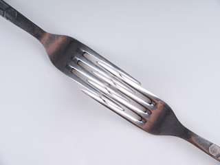 Fork on a gray background