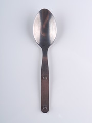 spoon on gray background