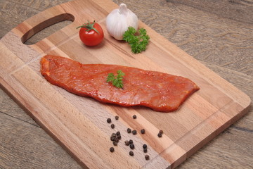 Pork neck slices on a plate