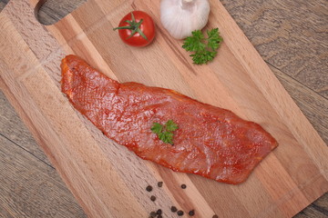 Pork neck slices on a plate