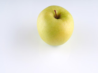 green apple on a gray background