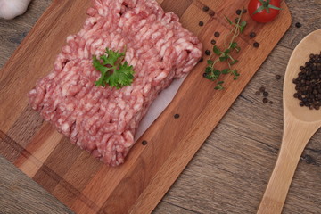 Raw minced meat with pepper, garlic