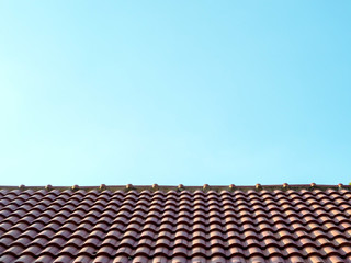 Naklejka premium Roof surface and blue sky