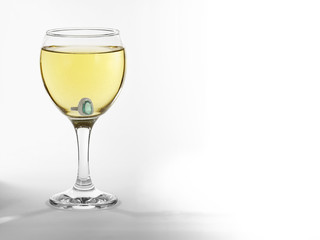 Glass with engagement ring