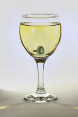 Glass with engagement ring