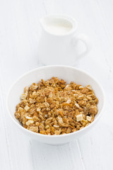 baked muesli in bowl and milk