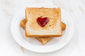toast with jam in the shape of a heart