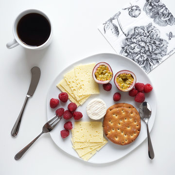 Breakfast with cheese and fruits