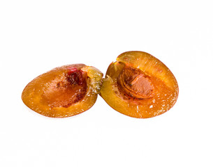 Plum with worm isolated on white - Cydia Funebrana