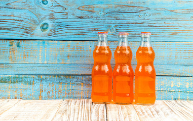 variety of soda bottle on the wooden background