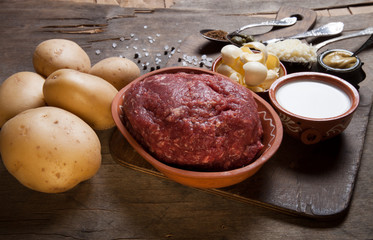 Set of ingredients for cooking on old wooden background. Selecti