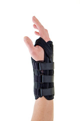 Person Wearing Supportive Brace on Wrist.