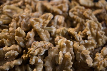 close-up wallnut on the black wood floor