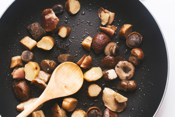 boletus mushrooms fried in a pan
