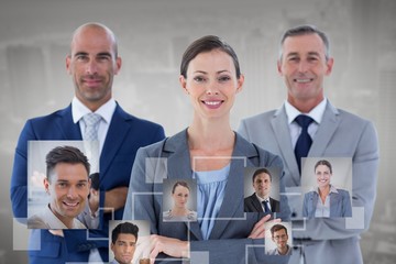 Composite image of business colleagues smiling at camera