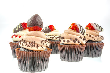 Chocolate Cupcakes on white background (Selective Focus)