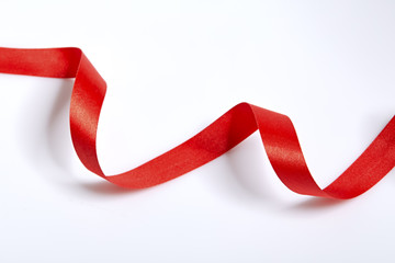 Red ribbon on a white background