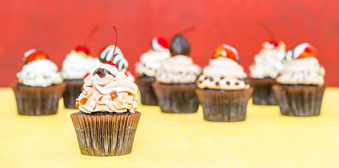 Chocolate Cupcakes on wood vintage background (Selective Focus)