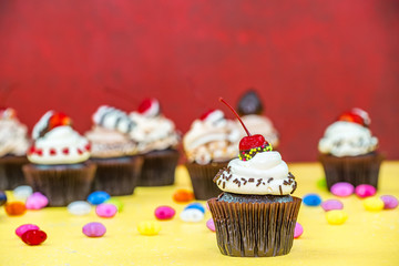 Chocolate Cupcakes on wood vintage background (Selective Focus)
