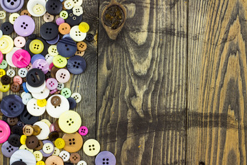 Fototapeta na wymiar Buttons on wooden table