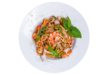 Pasta with seafood and parmesan cheese, isolated