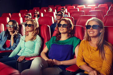 Obraz premium happy friends watching movie in 3d theater