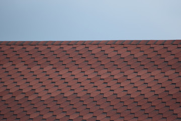 Decorative metal tile on a roof