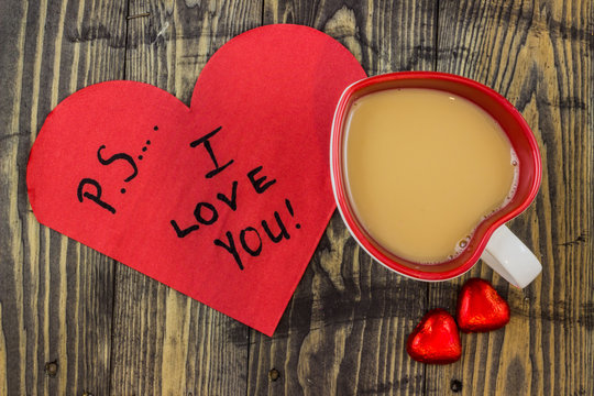 PS I love you with tea on wooden table