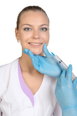 Young beautiful girl getting Botox injection from a syringe