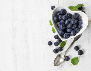 Healthy breakfast of muesli, berries with yogurt and seeds