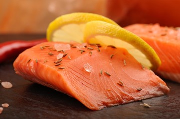 Wild salmon filet salted with pink himalayan salt, lemon and cum