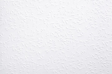 White embossed paper with floral pattern