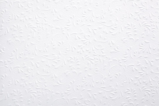 White embossed paper with floral pattern
