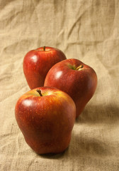 Three red apples