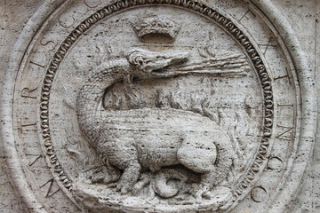 Dragon basrelief in Rome, Italy