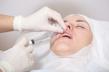Photo of cosmetic procedures .