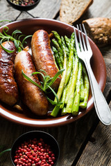 Grilled sausage with asparagus and rosemary