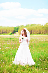 Lovely bride outdoors in a forest