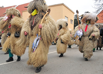 Traditional carnival with traditional figures, known as kurent, Ptuj, Slovenia - obrazy, fototapety, plakaty