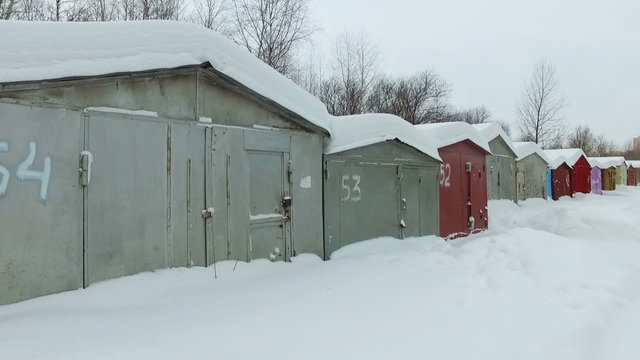 Metal garages in the Russian province in the winter time