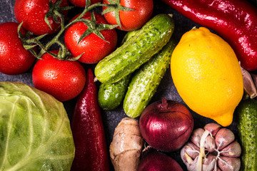 Assortment of fresh vegetables close up on black table
